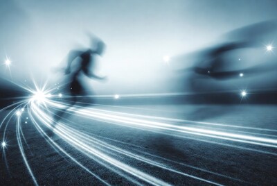 Blurred man running on track