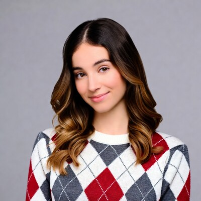 Smiling woman in argyle sweater