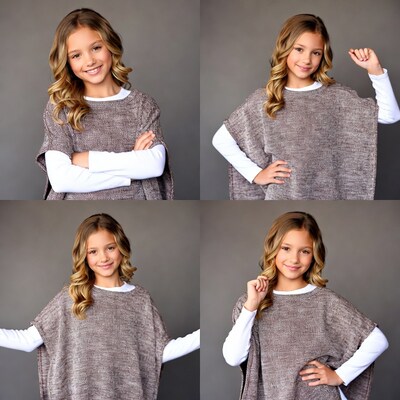 Smiling girl in gray poncho