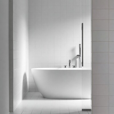 White Freestanding Bathtub in Tiled Shower