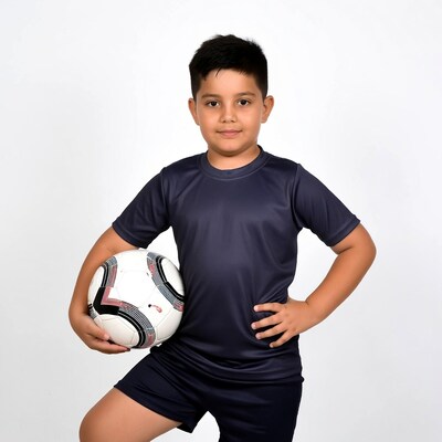 Boy holding soccer ball