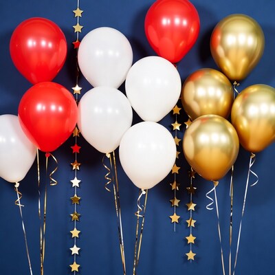 Red White Gold Balloons on Blue Background