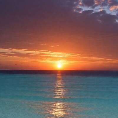 Sunset over turquoise ocean