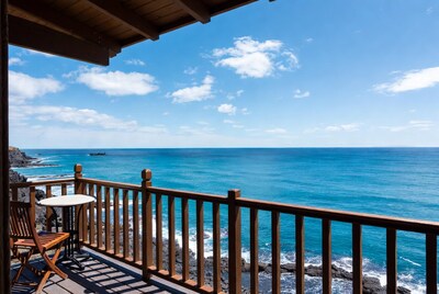 Wooden Deck Overlooking Ocean Cliff