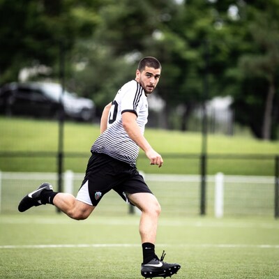 Soccer player running on field