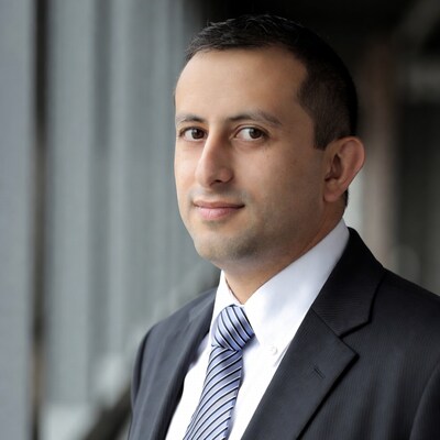 Man in suit with blue tie