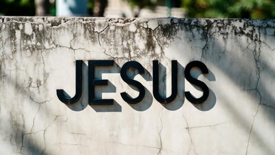 Jesus Sign on Cracked Wall