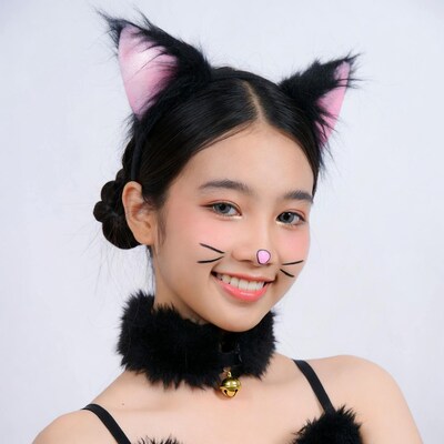 Asian girl in cat ears costume