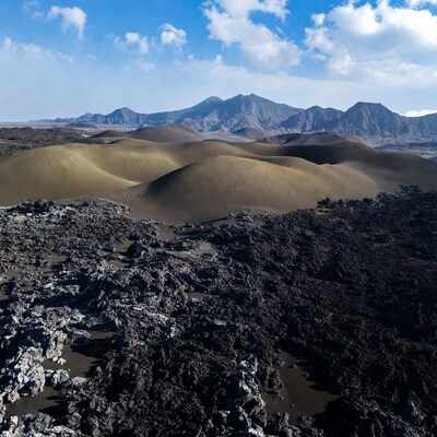 Volcanic Dunes and Mountains Landscape