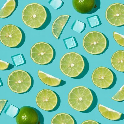 Lime Slices and Ice Cubes on Blue