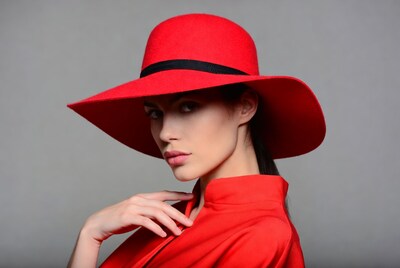 Woman in red hat and dress