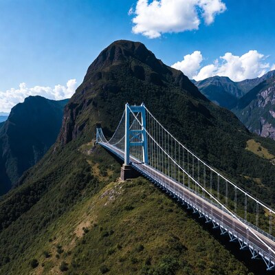 Suspension Bridge Over Mountain Valley