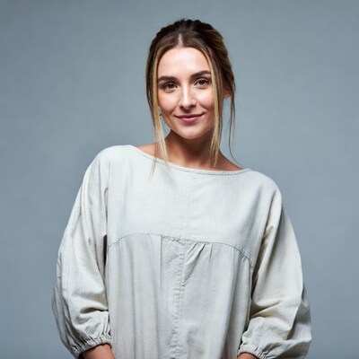 Smiling woman in white blouse
