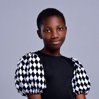 African girl in black checkered sleeve top