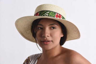 Asian woman wearing floral straw hat