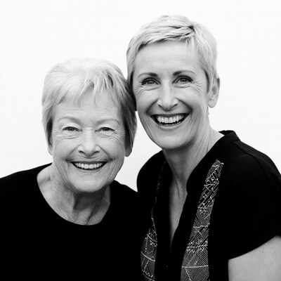 Two elderly women smiling together