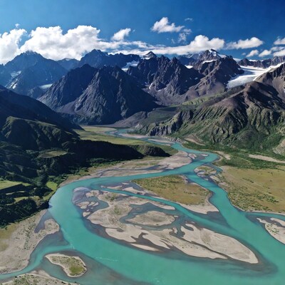 Turquoise River in Snowy Mountains
