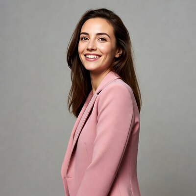 Smiling woman in pink blazer