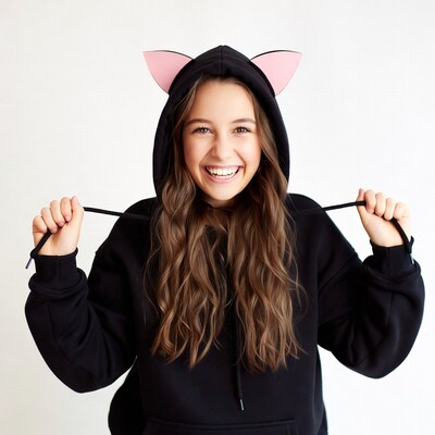 Girl in cat ear hoodie smiling