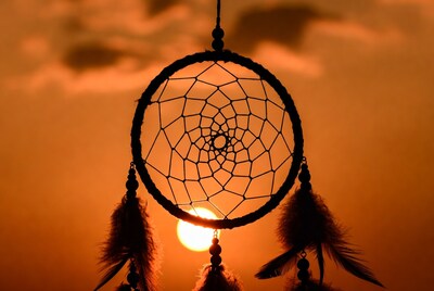 Dreamcatcher Silhouette Against Sunset