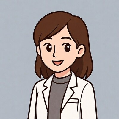 Smiling Asian woman in white lab coat