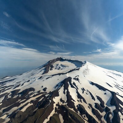 Snowy Volcanic Mountain Aerial View