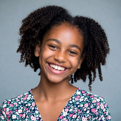 Smiling African-American girl with curly hair