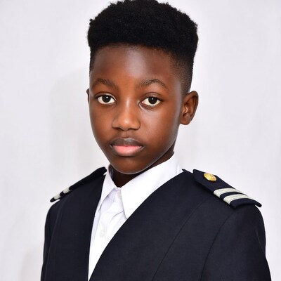 African boy in navy uniform