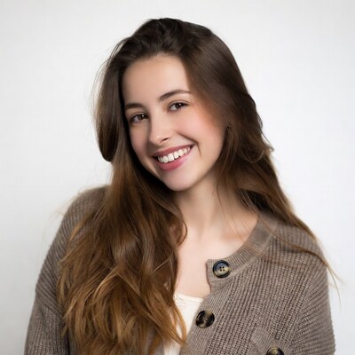 Smiling woman in beige cardigan