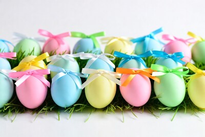 Colorful Easter Eggs with Ribbons in Grass