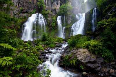 Majestic Triple Waterfall in Lush Forest