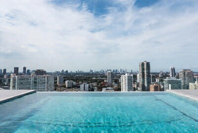 Infinity Pool Over City Skyline