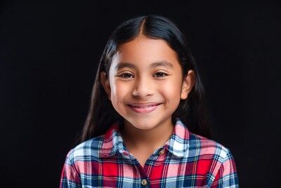 Smiling Asian girl in plaid shirt