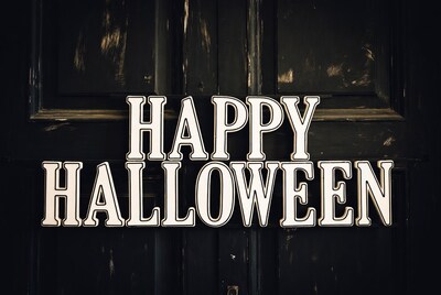 Happy Halloween sign on door