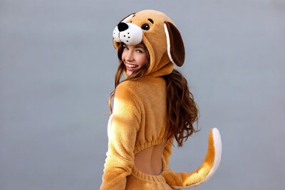 Woman in brown dog onesie costume
