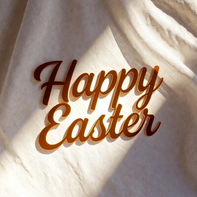 Happy Easter text on white fabric