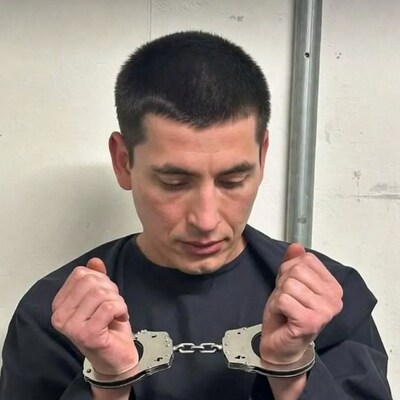 Man handcuffed in prison cell