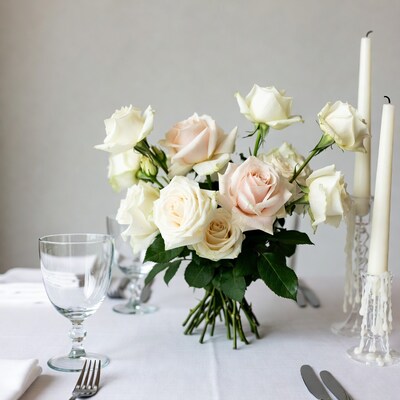 White and Pink Roses Bouquet on Table