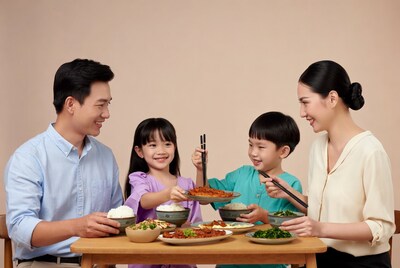 Asian family eating Korean dinner