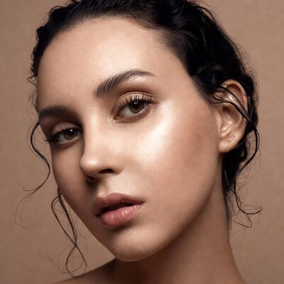 Closeup portrait of woman with wet black hair