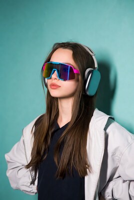 Girl with AirPods Max and colorful sunglasses