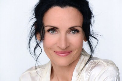 Woman with black hair smiling