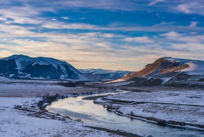 Snowy River Between Mountains at Sunset