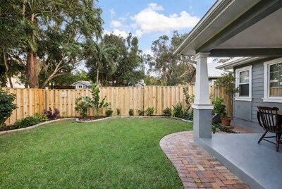 Backyard with Palm Trees and Porch