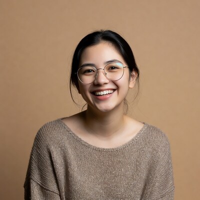 Asian woman smiling with glasses