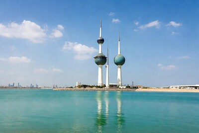 Kuwait Towers reflecting in water