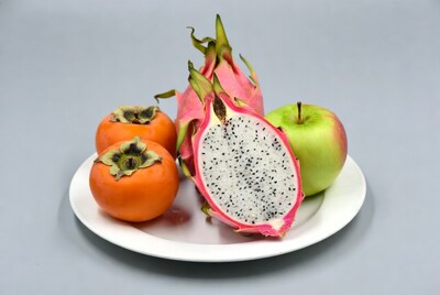 Persimmons, Dragon Fruit, Green Apple on Plate