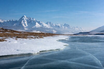 Snowy Mountains and Frozen River