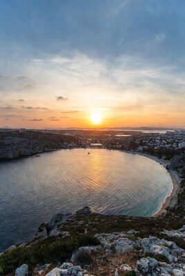 Sunset over Calanque de Sormiou bay