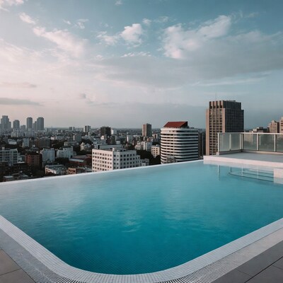 Infinity Pool Over City Skyline